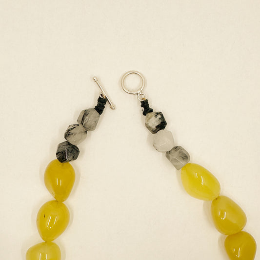 Grey sky yellow field